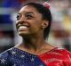 RIO DE JANEIRO, BRAZIL - AUGUST 07:  Simone Biles of the United States smiles before competing on balance beam during ...