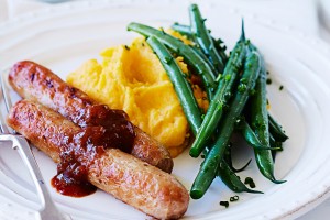 Italian sausages with pumpkin and potato mash