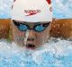 Xinyi Chen of China competes in heat four of the Women's 100m Butterfly.