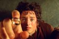 Elijah Wood's character Frodo reaches for the "One Ring", in the film the Fellowship of the Ring.