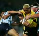 Former All Black Jerry Collins, pictured in action for the Hurricanes against the Waratahs in 2008.