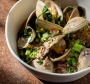 Clams with slow-cooked pig's head, confit garlic and greens is the go-to dish.