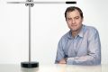 Jake Dyson with a Dyson CSYS desk lamp.