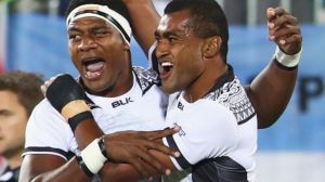 Viliame Mata and Ro Dakuwaqa celebrate as they win gold.