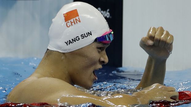 Sun Yang pumps his fist after winning the 200 metre freestyle