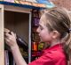 Students from Australia Street Infant School with their Street Library which was painted by kids in after school care.