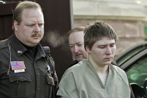 Conviction overturned: Brendan Dassey is escorted out of court in 2006.