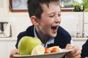 Lucas and Emily Olive enjoy their healthy afternoon tea of fruit rather than sugar-packed snacks.