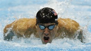 United States' Michael Phelps competes in a men's 100-meter butterfly swimming semifinal at the Aquatics Centre in the Olympic Park during the 2012 Summer Olympics in London, Thursday, Aug. 2, 2012.