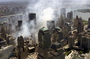  An AERIAL VIEW, days after the terrorist attacks on American soil, the towers of the WORLD TRADE CENTER (WTC) sit as a pile of rubble in the streets of New York City. The rescue and recovery efforts continue with tons of debris slowly removed from the si