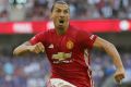 Manchester United's Zlatan Ibrahimovic celebrates after scoring a goal during the Community Shield soccer match between ...