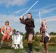 MELBOURNE, AUSTRALIA - NOVEMBER 17: Star Wars fan Mark Dickson poses for a photo with his wife Nancy (Dressed in ...