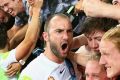 MELBOURNE, AUSTRALIA - DECEMBER 19: Ivan Franjic of the City celebrates with fans after winning the round 11 A-League ...