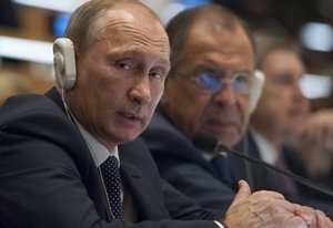 Vladimir Putin (left), President of the Russian Federation, listens to a speaker during the general debate of the General Assembly’s seventieth session. At his side is Sergey V. Lavrov, Minister for Foreign Affairs of the Russian Federation.