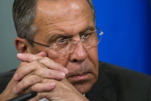 Russian Foreign Minister Sergey Lavrov listens during his and U.S. Secretary of State John Kerry news conference following their long talks in Moscow, Russia, Friday, July 15, 2016.