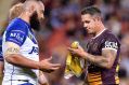 BRISBANE, AUSTRALIA - AUGUST 18: Corey Parker of the Broncos and Sam Kasiano of the Bulldogs exchange words during the ...