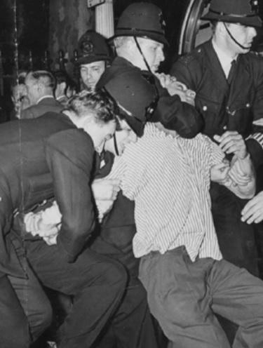 A member of the 62 group is arrested in Victoria Park, London, 1962