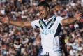 The redeemer: Jarryd Hayne strikes a messianic pose at Campbelltown Sports Stadium.