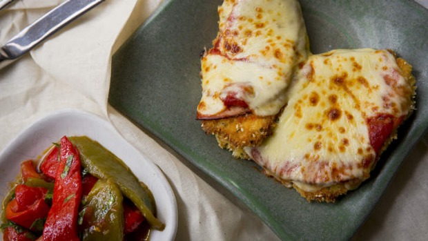 Frank Camorra's chicken parmigiana, and roast capsicum and tomato salad.