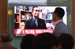 People watch a TV news program showing a file image of Thae Yong Ho, minister at the North Korean Embassy in London, at Seoul Railway Station in Seoul, South Korea, Wednesday, Aug. 17, 2016. Thae has defected to South Korea, becoming one of the highest Northern officials to do so.