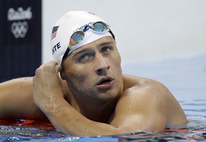 United States' Ryan Lochte checks his time in a men's 4x200-meter freestyle heat during the swimming competitions at the 2016 Summer Olympics, Tuesday, Aug. 9, 2016, in Rio de Janeiro, Brazil.