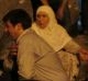 A man cries over a covered body after the Gaziantep blast.