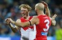 GEELONG, AUSTRALIA - JULY 08:  Callum Mills of the Swans (L) celebrates a goal with Jarrad McVeigh during the round 16 ...