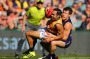 PERTH, AUSTRALIA - AUGUST 14: Lee Spurr of the Dockers tackles Eddie Betts of the Crows during the round 21 AFL match ...