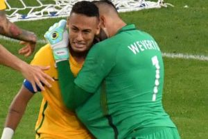 Neymar is overcome with emotion after scoring the winning penalty.