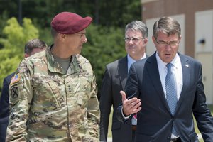 File - Defense Secretary Ash Carter speaks with Army Lt. Gen. Stephen Townsend, left, commanding general of the XVIII Airborne Corps, during a visit to Fort Bragg, N.C., July 27, 2016.