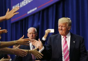 Republican presidential candidate Donald Trump arrives to speak at a campaign rally in Fredericksburg, Va., Saturday, Aug. 20, 2016.