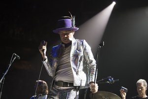 Paul Langlois, left, Gord Downie and Johnny Fay of The Tragically Hip perform on Wednesday, August 10, 2016