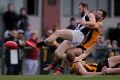 Travis Cloke gets tackled in the VFL match against the Box Hill Hawks.