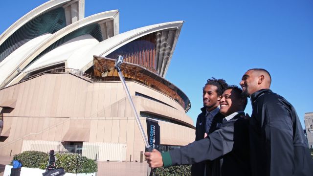 Hawaii Rainbow Warriors' players Marcus Kemp, left, Steven Lakalaka and Makan Kema-Kaleiwahia enjoy the sites around Sydney.