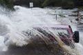 High water at the West Oxford falls crossing as rains increase in Sydney . Photo Nick Moir 24 August 2016