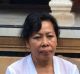 Ketut Arsini, the widow of slain police officer Wayan Sudarsa.