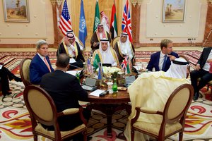 U.S. Secretary of State John Kerry sits with, clockwise from top, Saudi Arabia Foreign Minister Adel al-Jubeir, United Kingdom Under Secretary of Foreign Affairs Tobias Ellwood, United Arab Emirates Foreign Minister Abdullah bin Zayed, and United Nations Special Envoy for Yemen Ismaïl Ould Cheikh Ahmed on August 25, 2016, in the Royal Terminal 1 at King Abdulaziz International Airport in Jeddah, Saudi Arabia at the outset of a five-way meeting focused on Yemen.