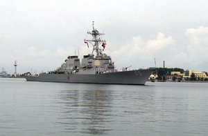 The guided missile destroyer USS Benfold arrives in port in Qingdao in eastern China's Shandong Province, Monday, Aug. 8, 2016.