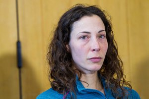 Czech tourist Pavlina Pizova attends a press conference at a police station in Queenstown, New Zealand