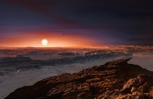 Artist’s impression showing a view of the surface of the planet Proxima b orbiting the red dwarf star Proxima Centauri, the closest star to the Solar System.  Proxima b is a little more massive than the Earth and orbits in the habitable zone around Proxima Centauri, where the temperature is suitable for liquid water to exist on its surface.