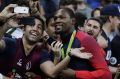 Smile: Kevin Durant takes selfies with fans after winning the men's basketball gold medal.