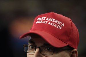 Make America Great Again hat in support of Donald Trump at a rally at Veterans Memorial Coliseum at the Arizona State Fairgrounds in Phoenix, Arizona, United States