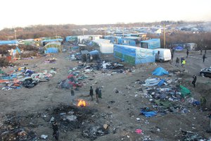 File - A bird's eye view of the Calais Jungle refugee camp, France,  17 January, 2016. Former French President Nicolas Sarkozy has suggested that the camp should be moved to the UK.