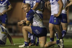 Still chasing fourth spot: Bulldogs players show their dejection during the round-25 match between Canterbury and the ...