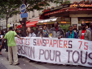 Organization of <i>sans-papiers</i> at a May 22, 2008 general strike march organized by the Confdration Gnrale du Travail (CGT). Banner calls for ?regularization for all.? Photo credit: Marie Kennedy