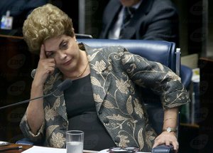 Brazilian President Dilma Rousseff listens during a Senate impeachment hearing, Brasilia, Brazil, 29 August, 2016. The Brazilian Senate subsequently voted in favour of her impeachment.