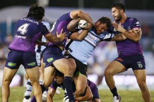 Grappling for the minor premiership: Cronulla Sharks and the Melbourne Storm go head to head on Saturday night.