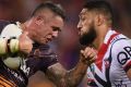 Brisbane skipper Corey Parker hurls himself at the Roosters defensive line.