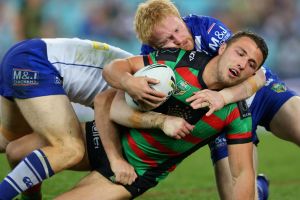 Best of enemies: James Graham gets to grips with Sam Burgess in another episode in the pair's abrasive rivalry.