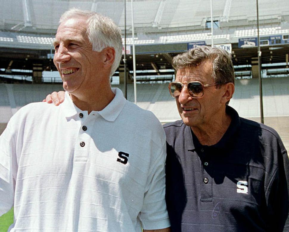 Jerry Sandusky, L, and Joe Paterno, R.  [Reuters]